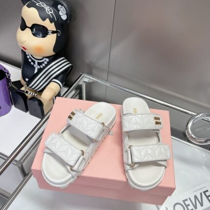 miu miu Matelassé nappa leather slides